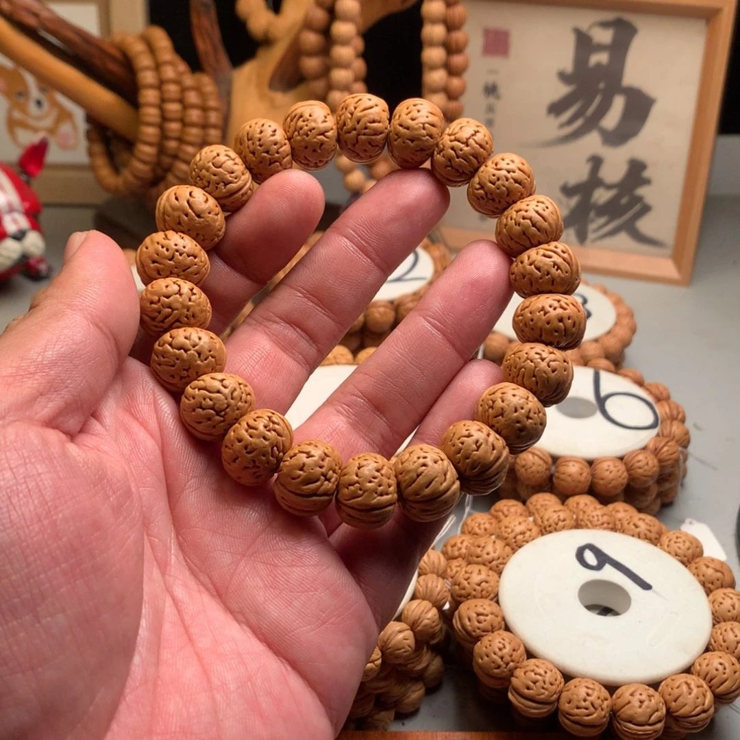 核***器手串桃核1.7树王纽扣桃核手持