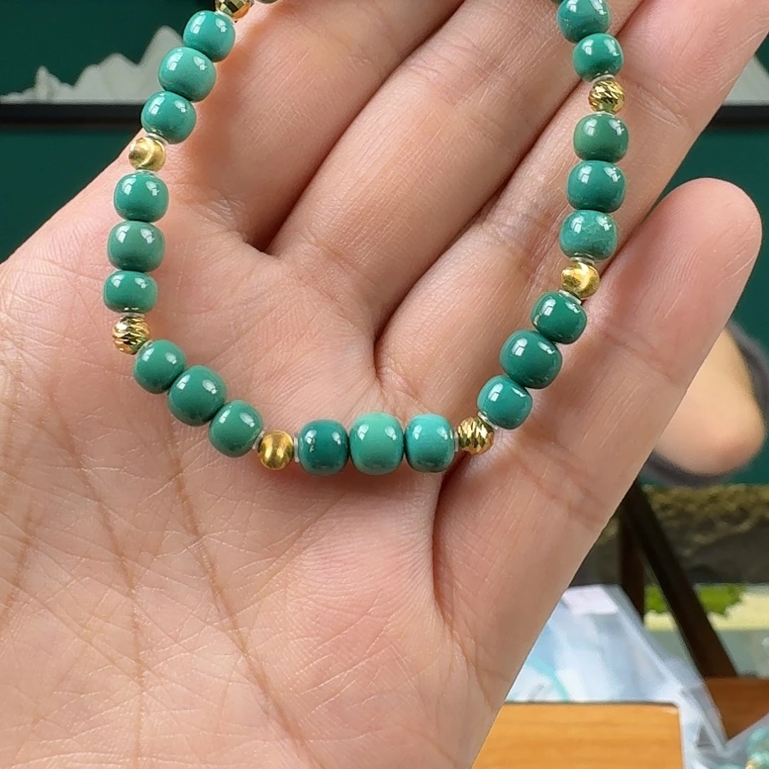 用***9绿松石18K金镶嵌珠宝奇石