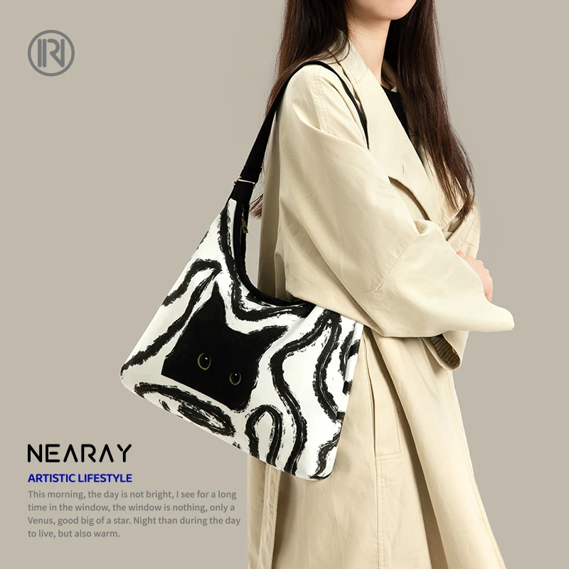 尼睿x可乐不加冰 新款原创黑白简约猫咪单肩包休闲斜挎帆布包包女