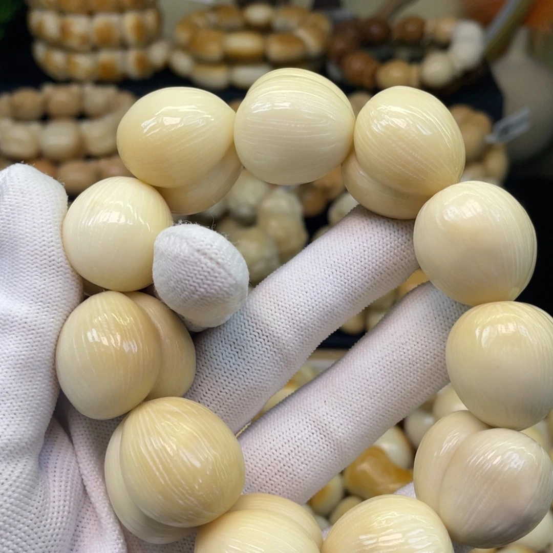 吊坠菩提根/象牙果125拉丝屁桃