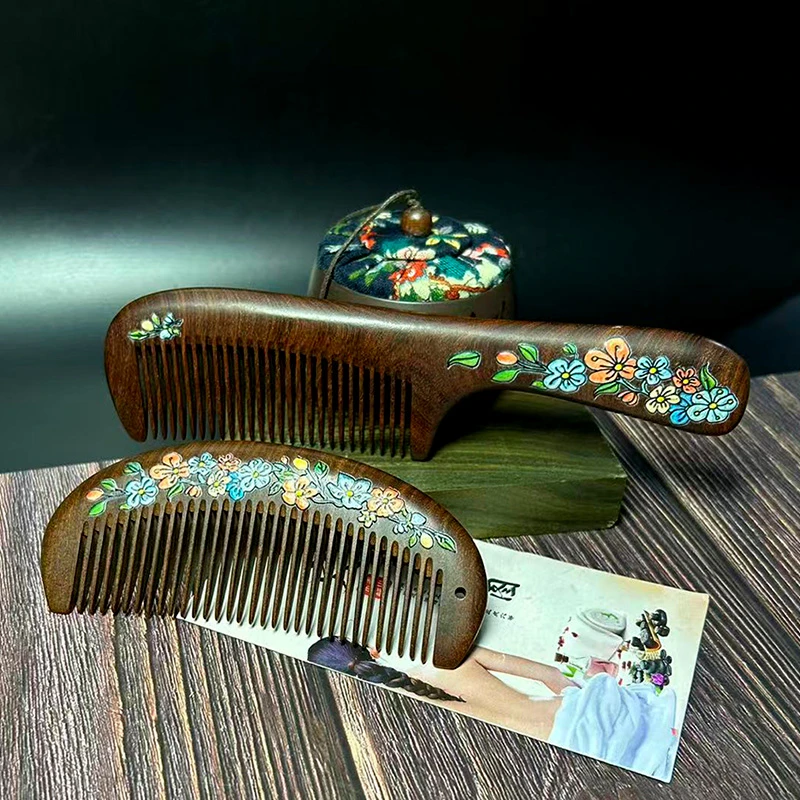 立体彩绘月梳黑金檀木梳子