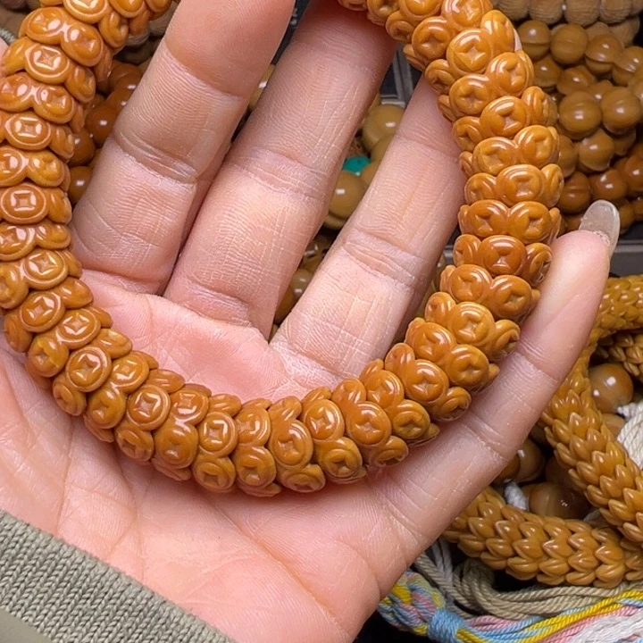 吊坠橄榄核小**丶聚宝盆