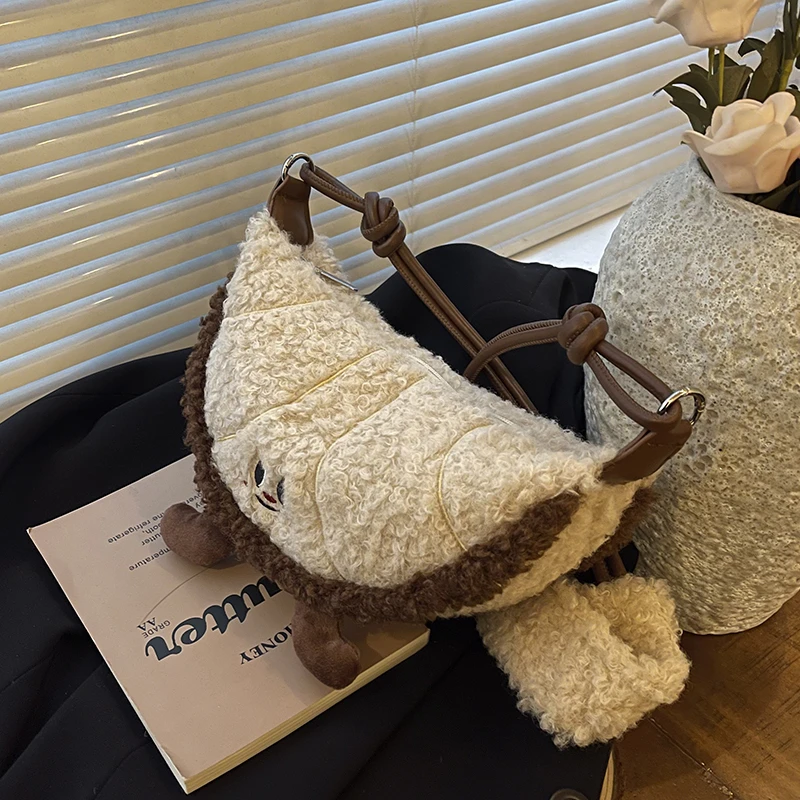 小众毛绒秋冬包包女款爆款2025新款百搭斜挎毛毛包精致超火饺子包
