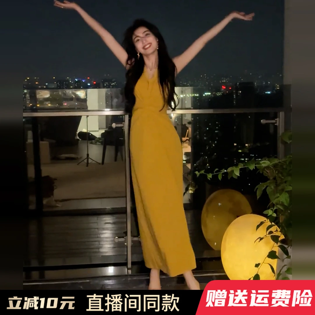 2025新款法式纯欲黄色V领连衣裙子女早秋高级感气质掐腰绑带长裙