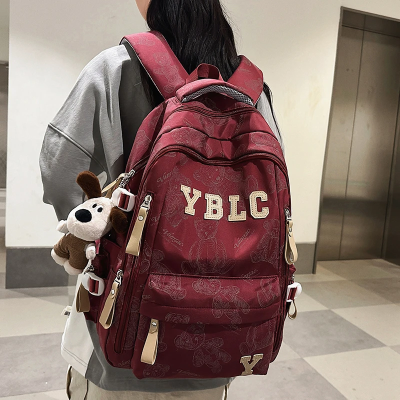 简约韩版休闲双肩包时尚成人旅行减负初中学生书包高中大学生背包