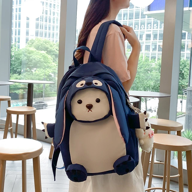 可爱玩偶书包ins小众初中女生小学生大容量女童卡通丑萌双肩包