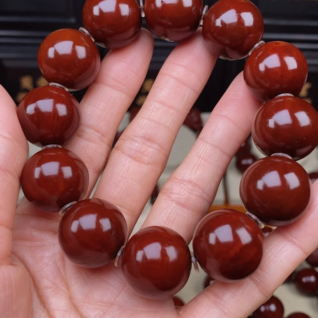简***单橄榄核吊坠四花光珠