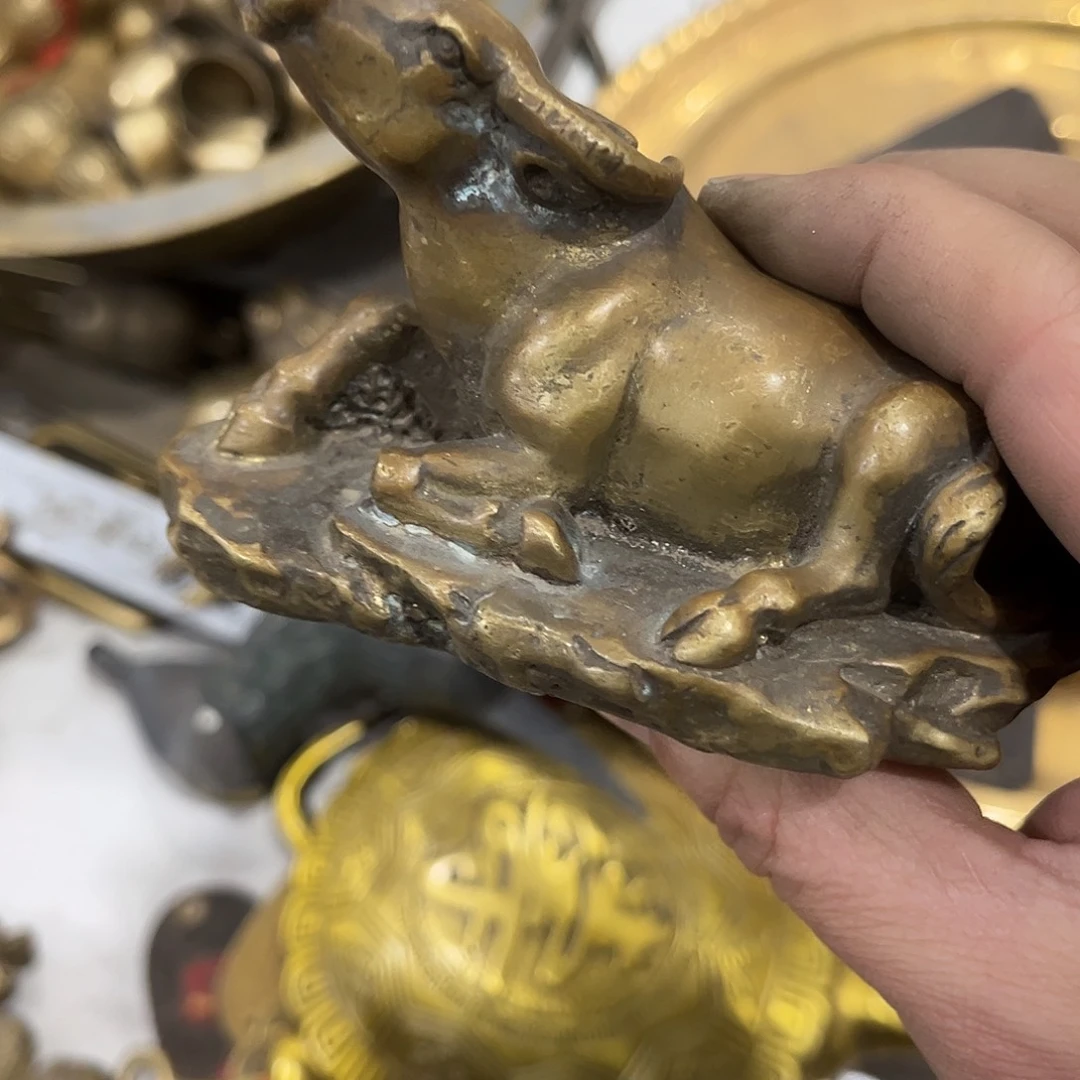 人***遇闪电购铜摆件工艺品