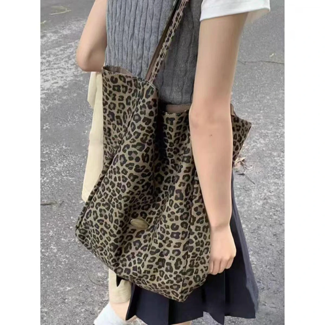 双面ins豹纹帆布包包女2025新款时尚学院托特包休闲大容量布袋子