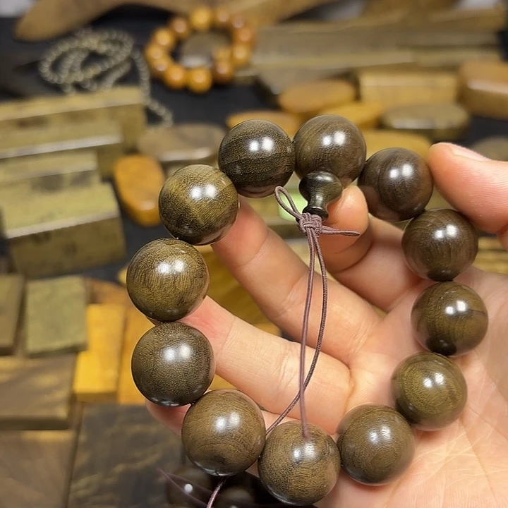 霸***天金丝楠一物一拍链接