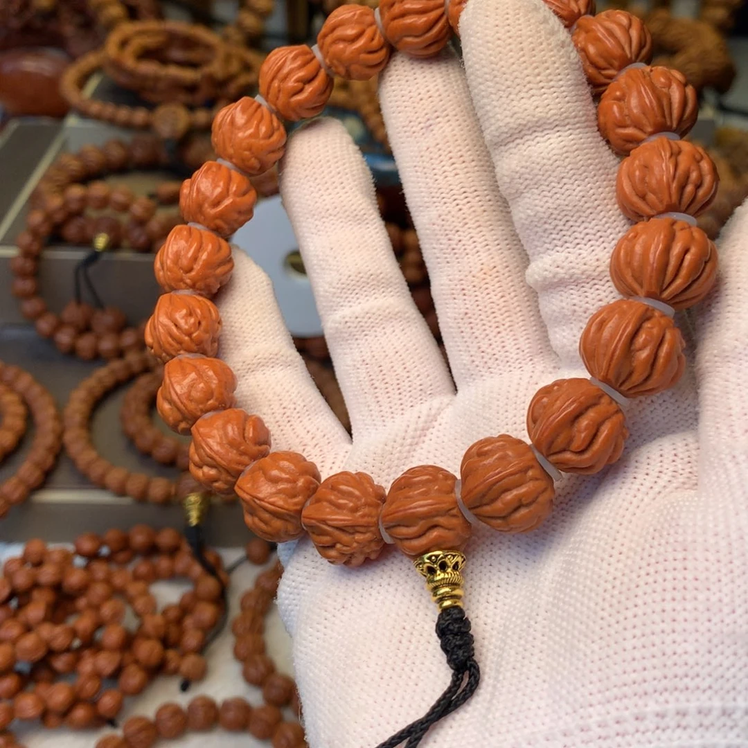 请***哈手串桃核秦岭龙纹