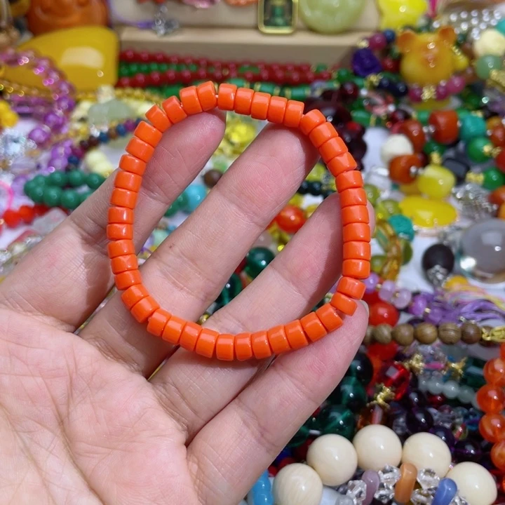 树脂制品55号橘色手链