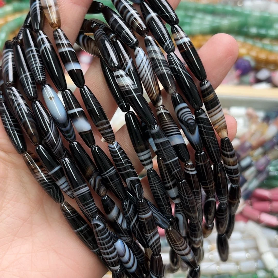 玛瑙/玉髓未镶嵌珠宝半成品6×24黑条纹玛尖珠一条