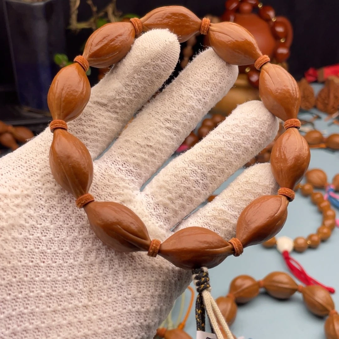 贝***塔橄榄核手串橄榄核水晶核1529