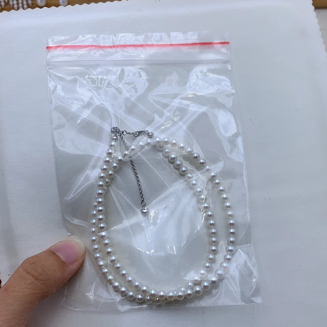 合金胸饰淡水珍珠