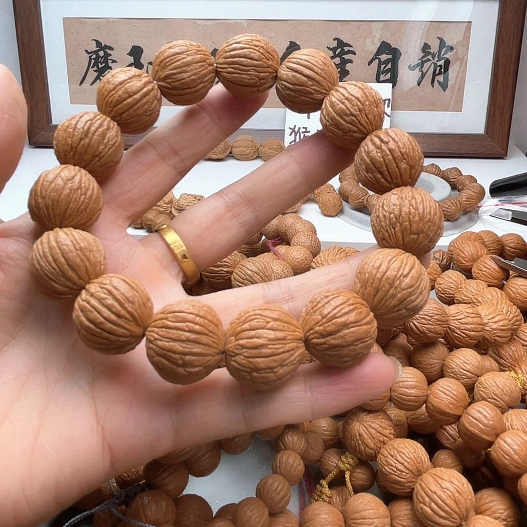 t***9核桃老树猴头球核手串