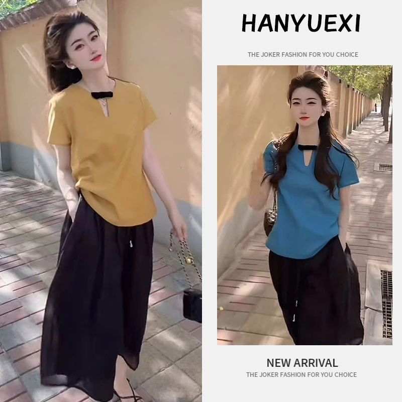 今年流行穿搭一整套2025新款宽松减龄短袖上衣休闲风半身长裙套装