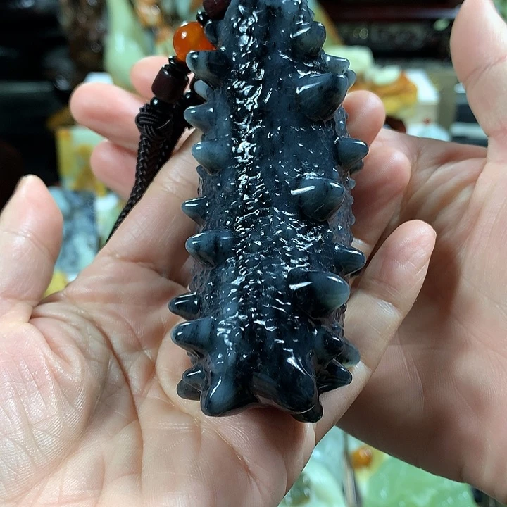 蛇纹石玉手把件未镶嵌军**家