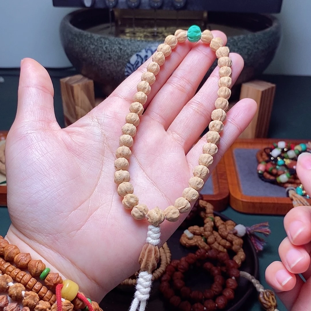 柏香籽/百香籽吊坠209.9莲花