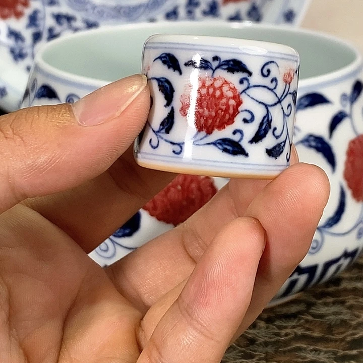 牛****儿釉里红缠枝莲扳指