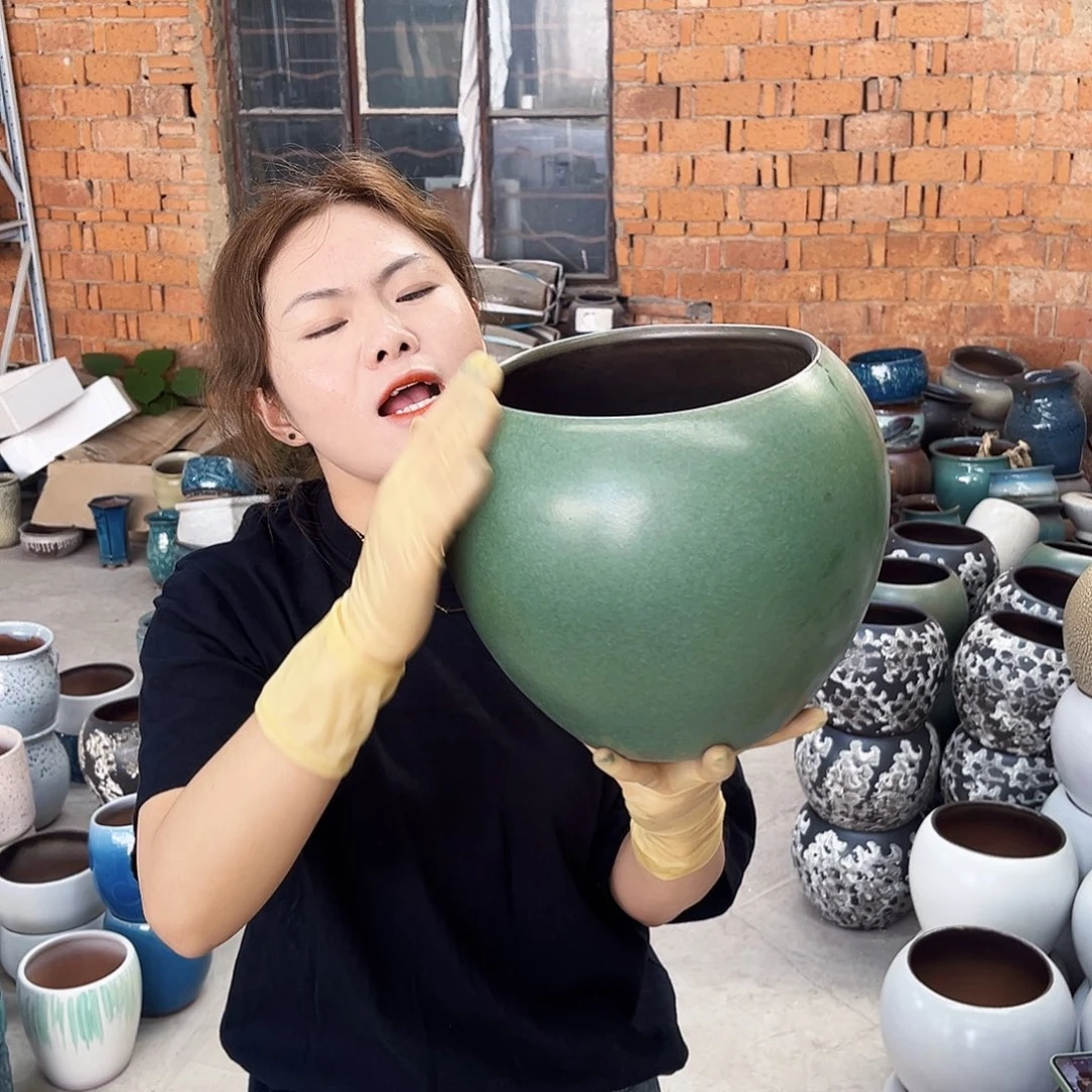 紫砂花盆正品口19高23。z z