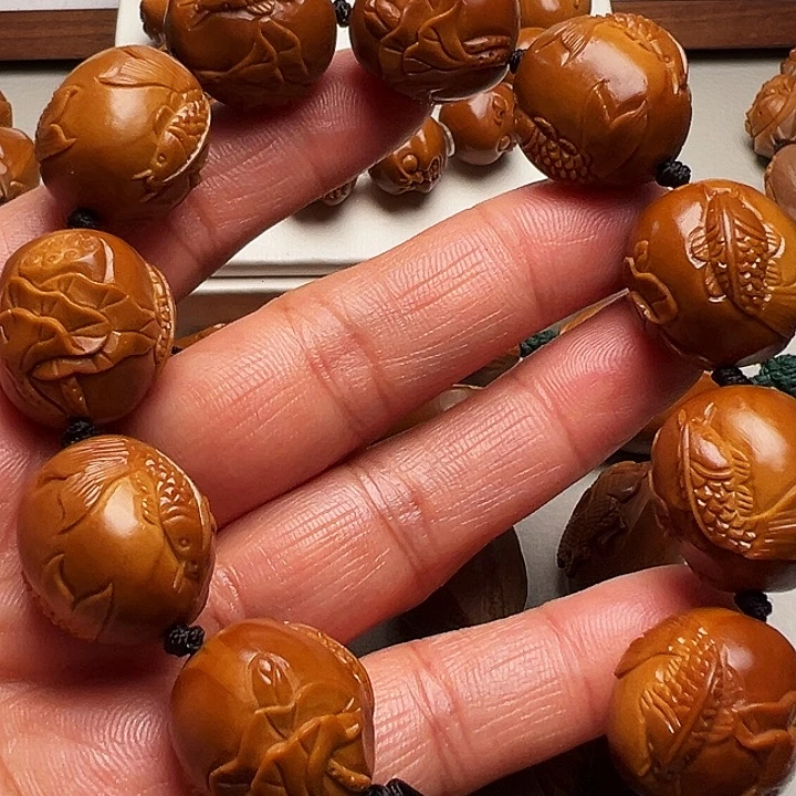 葫****橄榄核手串/手链莲花鱼