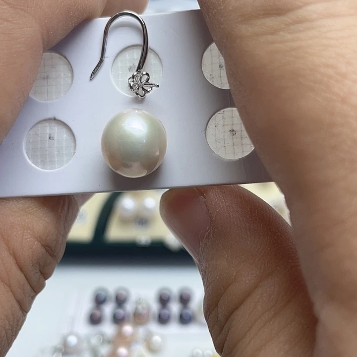 琳***琅淡水珍珠耳饰银S925镶嵌
