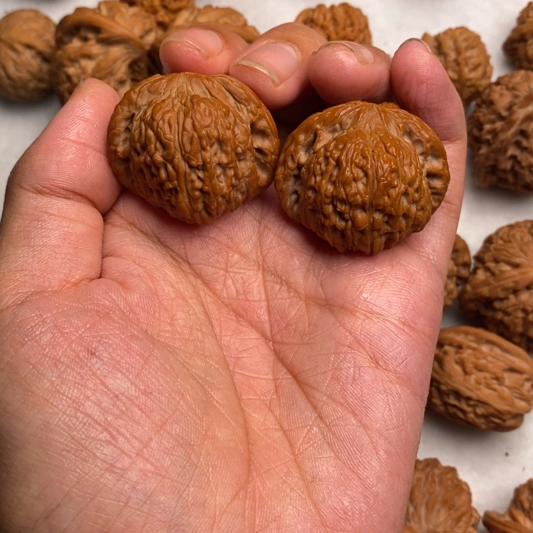 文玩核桃吊坠锦***乐泥鳅背