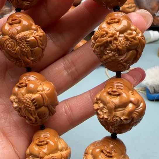 溜***达桃核吊坠#橄榄雕工艺品