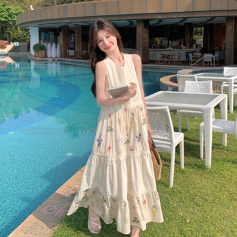 温柔风蕾丝拼接碎花背心连衣裙女夏季甜美宽松A字大摆裙度假长裙