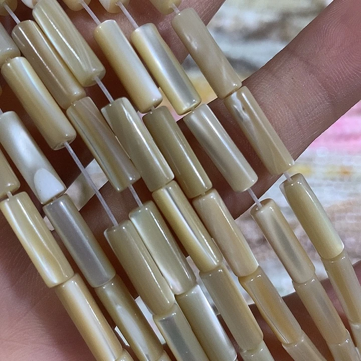 一条4mmx13咖色马蹄螺管珠