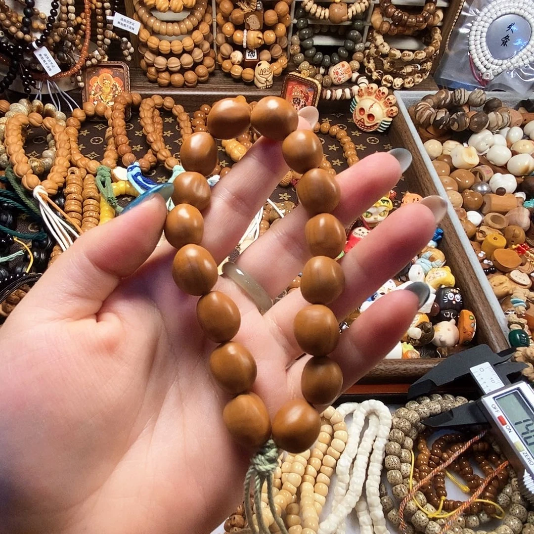 核桃橄榄核糖豆呀