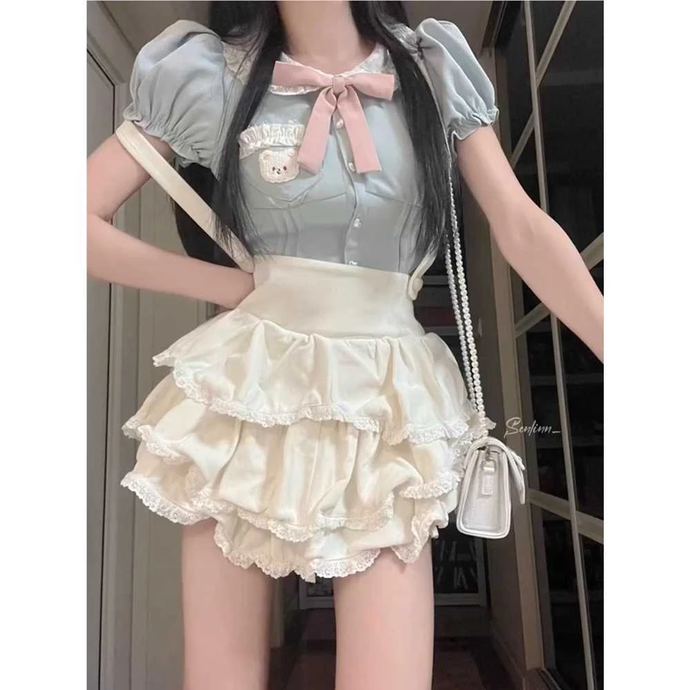 夏季学院风甜酷辣设计感撞色拼接修身娃娃领上衣高腰背带裙套装裙