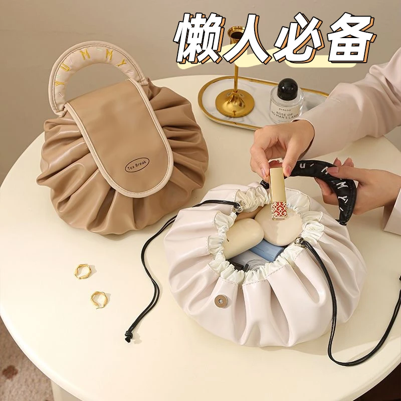 化妆包女大容量2025出差便携式懒人旅行收纳抽绳新款洗漱包防水