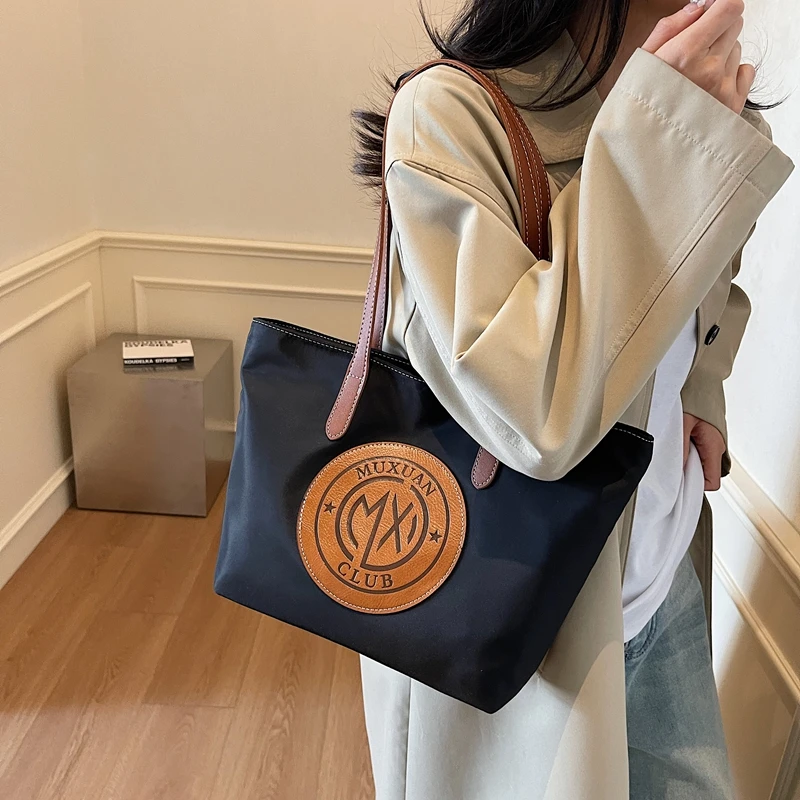 包包女新款百搭轻便单肩包简约托特包通勤时尚大容量休闲女士包潮