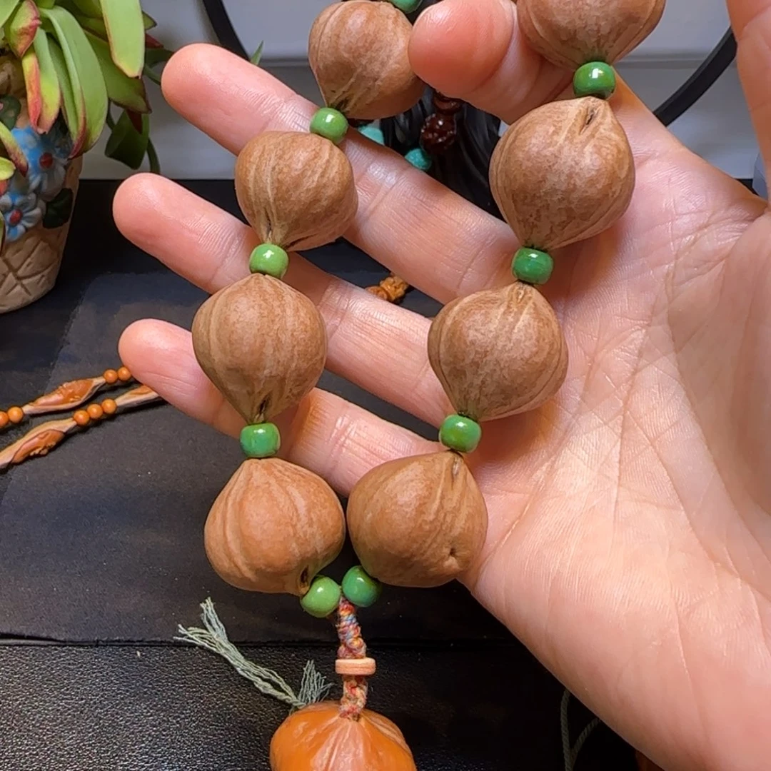 橄榄核手串/手链西**詩素核手持
