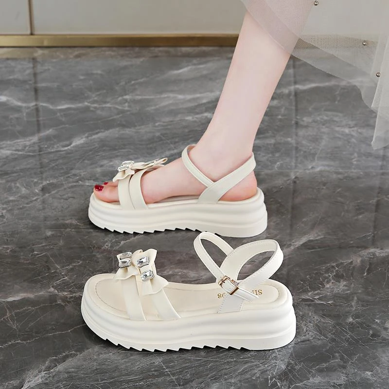 白色凉鞋女款2025新款夏季法式仙女风蝴蝶结一字带厚底松糕罗马鞋