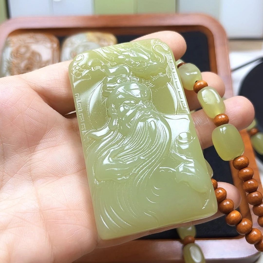 过***。非金属关公牌子的
