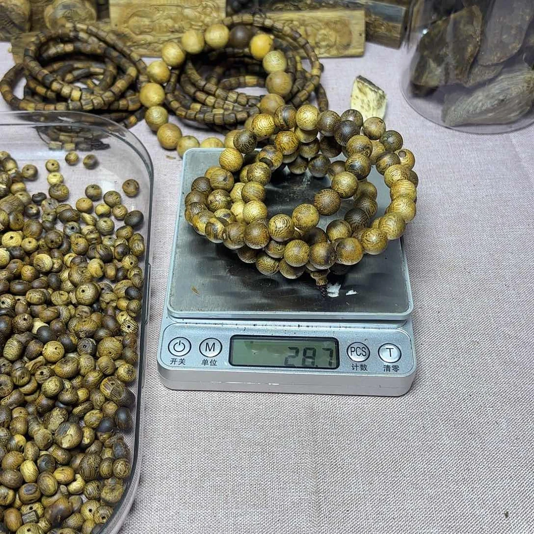 竹***泉木奇楠微瑕散圆珠28克卡1.0