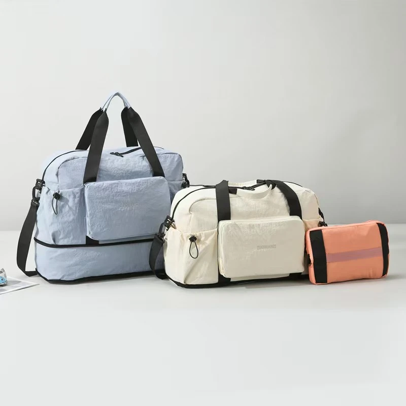 旅行包肩包手提款刺绣单肩斜挎耐磨纯色防水可折叠百搭旅行袋时尚