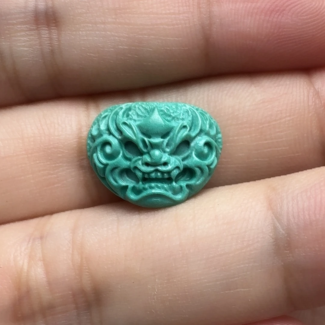 绿松石未镶嵌兽面背云