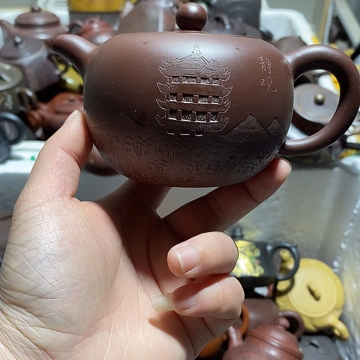 紫砂茶壶微瑕微笑