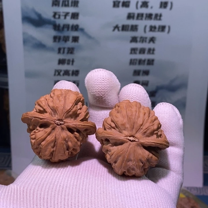 文玩核桃把件丘****。凤凰