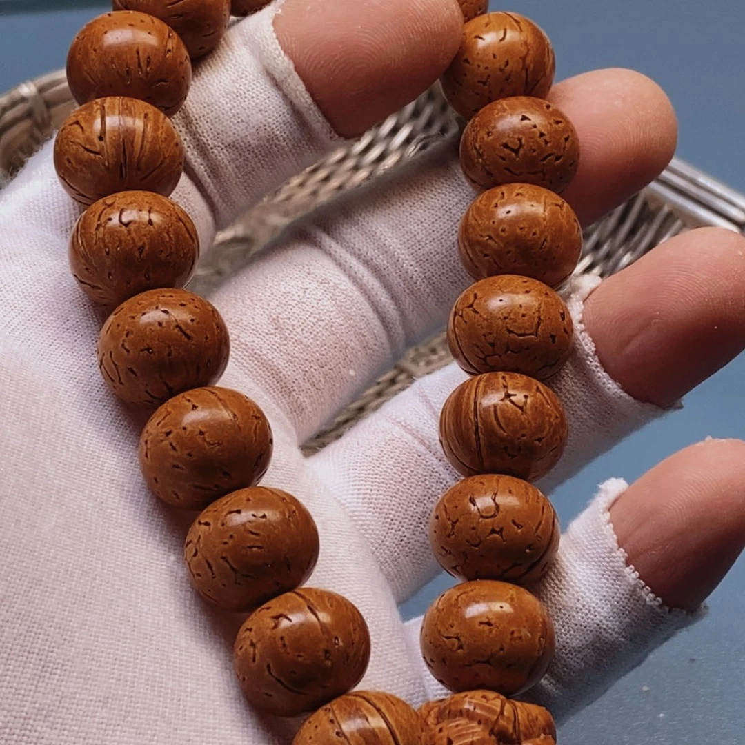 农**械桃核手串15乘13加25.8米