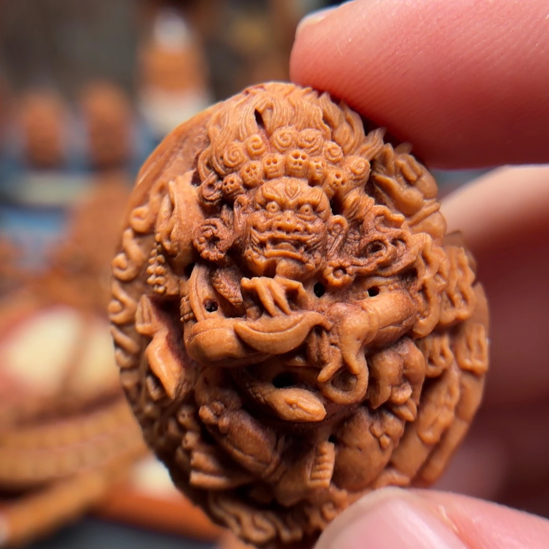 闲***事桃核雕刻藏传大黑天