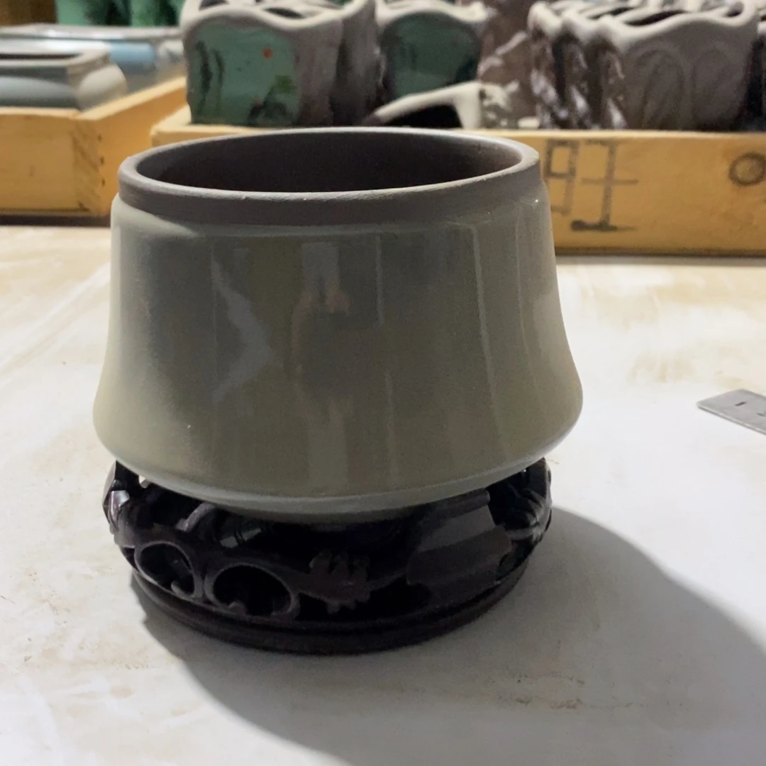 紫砂口9高7。陶瓷