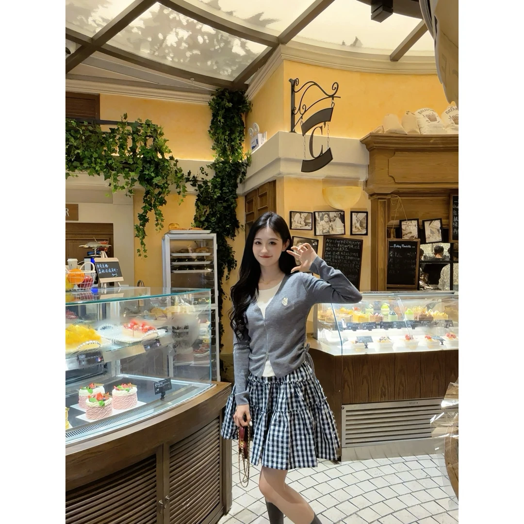 GIRDEAR/哥弟2025新款假两件时尚针织羊毛衫抽绳收腰上衣女148035