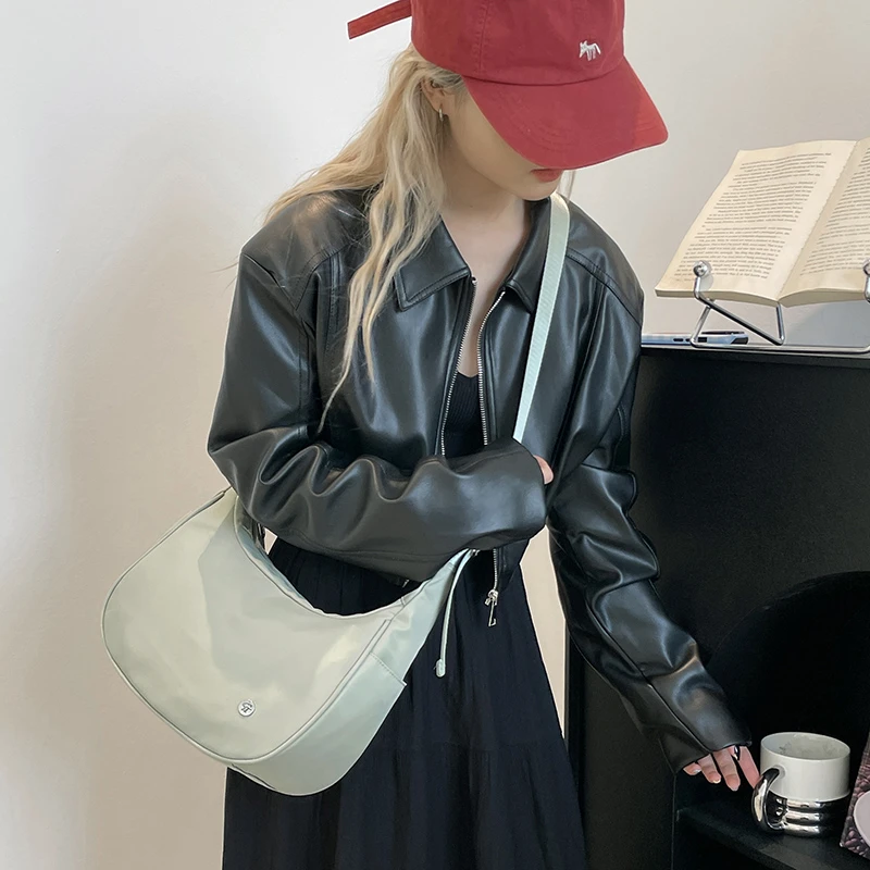 休闲简约饺子包尼龙帆布包包女2025新款斜挎包百搭胸包轻便腋下包