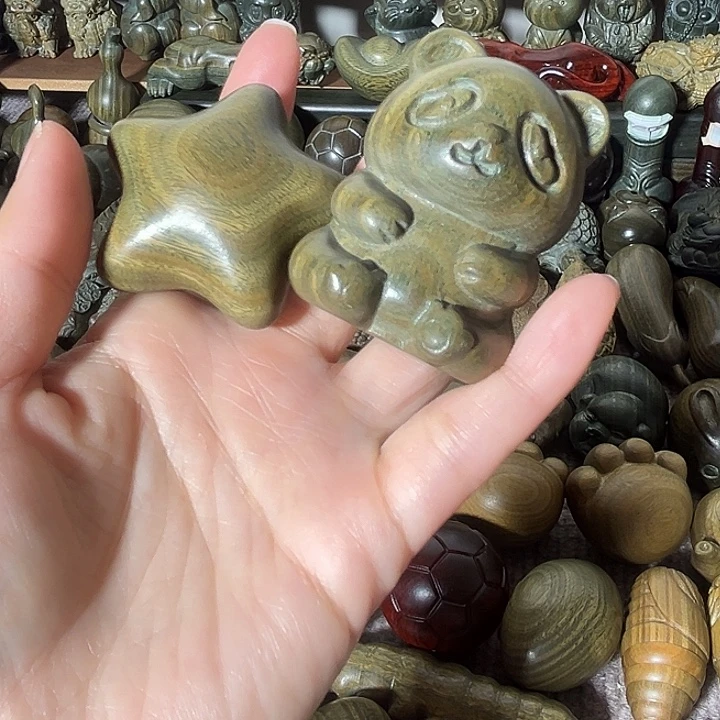 ****瓜木阿根廷绿檀手把件