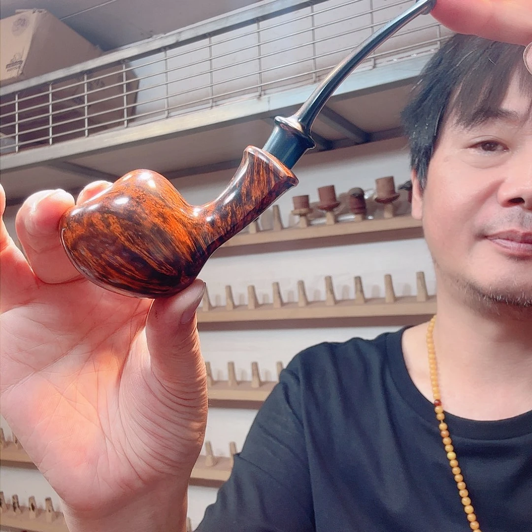 大*焦耀烟斗一鸡毛